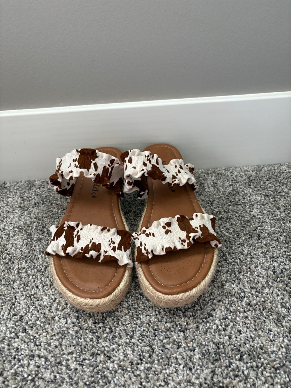 Altar'd State Brown and White Cow-Print Ruffle Platform Sandals